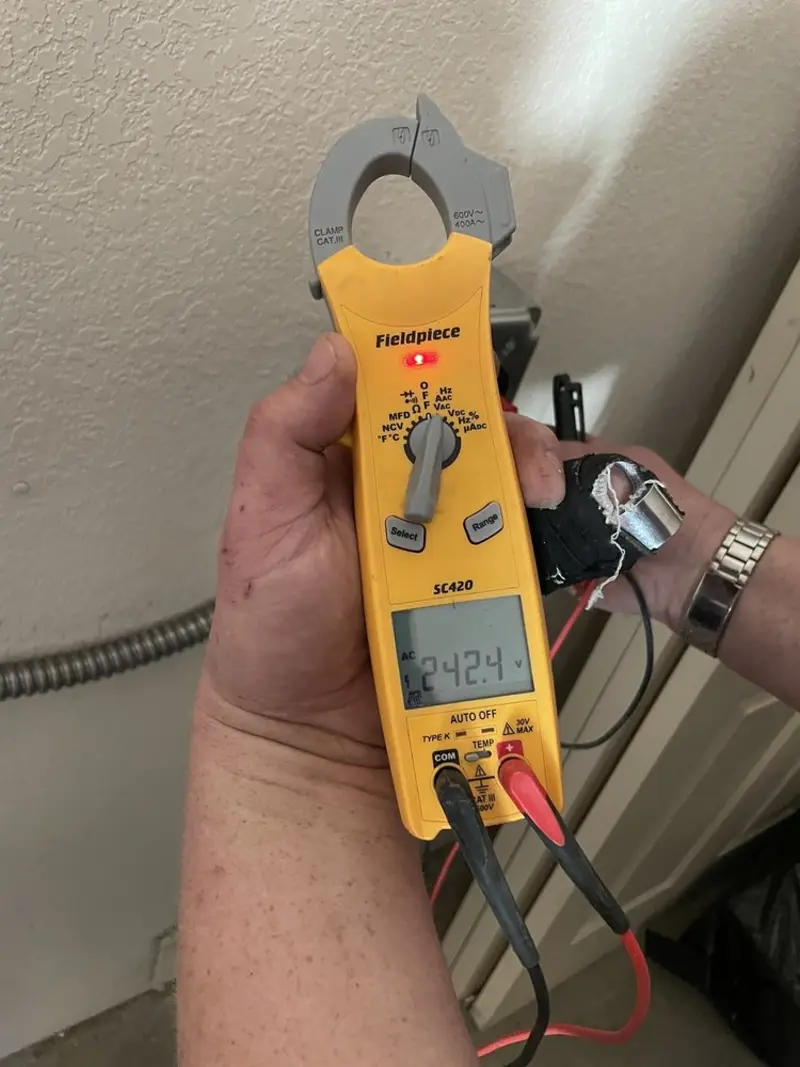 Voltage testing with clamp meter during Circuit Breaker Repair in Homestead Meadows North